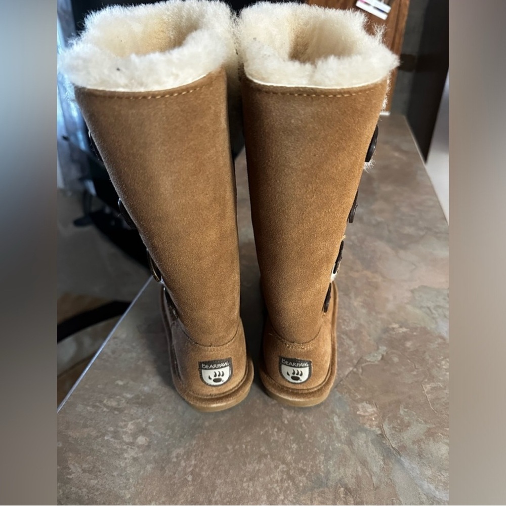 Bear-paw boots never worn